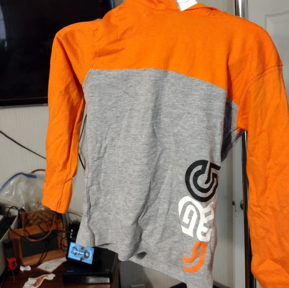 Boys long sleeve hoodie, orange and white, by Underground. Size 3T.